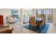 Open-concept living space featuring elegant furnishings and a seamless flow to the outdoors at 234 Mariner Dr # 234, Tarpon Springs, FL 34689