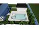 Aerial view of a modern pool and spa in a well-landscaped backyard with a privacy fence at 235 24Th Se Ave, St Petersburg, FL 33705