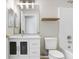 Clean bathroom with white vanity, large mirror, and a shower-tub combination, providing a functional space at 24941 Ravello St, Land O Lakes, FL 34639