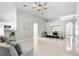 Spacious living and dining areas with neutral paint, ceiling fan, and tile flooring at 24941 Ravello St, Land O Lakes, FL 34639
