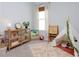 Bedroom featuring neutral carpet, teepee, desk, and bookshelf at 2516 Leafwing Ct, Palm Harbor, FL 34683