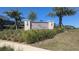 The Silver Ridge community sign surrounded by lush landscaping at 2516 Leafwing Ct, Palm Harbor, FL 34683