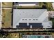 Overhead view of the roof, highlighted with efficient solar panels installed at 2516 Leafwing Ct, Palm Harbor, FL 34683