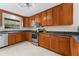 Well-maintained kitchen with stainless steel appliances and ample cabinet space at 2700 Bayshore Blvd # 512, Dunedin, FL 34698