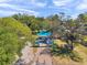 Aerial view of the community playground featuring shaded seating area providing Gathering-friendly amenities at 36750 Us 19 N # 2763, Palm Harbor, FL 34684