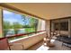 Balcony view with a chair overlooking the golf course at 36750 Us 19 N # 2763, Palm Harbor, FL 34684