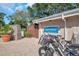 Lochness building exterior featuring bike racks and lush landscaping offering recreational conveniences at 36750 Us 19 N # 2763, Palm Harbor, FL 34684