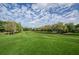Beautiful view of the lush green golf course, perfect for outdoor recreation and leisure activities at 36750 Us 19 N # 2763, Palm Harbor, FL 34684