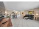 Spacious living room with tile flooring, dining area, and kitchen at 36750 Us 19 N # 2763, Palm Harbor, FL 34684