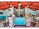 Vibrant pool bar area with stone accents, colorful decor, and inviting atmosphere at 36750 Us 19 N # 2763, Palm Harbor, FL 34684