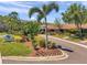 The Salamander Spa entrance features lush landscaping, palm trees, and a serene pathway to relaxation at 36750 Us 19 N # 2763, Palm Harbor, FL 34684