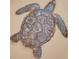 Unique decorative metal sea turtle hanging on a light beige wall at 36750 Us 19 N # 2763, Palm Harbor, FL 34684