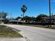Street scene featuring nearby houses and a waterway, showcasing the community's charm and coastal location at 4005 Sunrise S Dr, St Petersburg, FL 33705