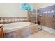 Elegant bathroom featuring a soaking tub and a separate glass-enclosed shower with tiled walls at 4499 Chase Oaks Dr, Sarasota, FL 34241