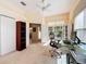 Bright office area with an exterior view, neutral paint, and a ceiling fan at 4499 Chase Oaks Dr, Sarasota, FL 34241