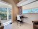 Comfortable office space with natural light, ideal for remote work or study, offering privacy and functionality at 4499 Chase Oaks Dr, Sarasota, FL 34241