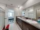 Bathroom featuring granite countertops and a shower/tub combo at 5210 Dandelion St, Apollo Beach, FL 33572