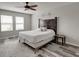 Bedroom showcasing a wood headboard and wood-look flooring at 5210 Dandelion St, Apollo Beach, FL 33572