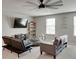 Comfortable bonus room featuring neutral walls, carpet, television, and plenty of seating at 5210 Dandelion St, Apollo Beach, FL 33572
