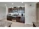 A lovely kitchen with granite counters, stainless steel appliances, and tile flooring at 5210 Dandelion St, Apollo Beach, FL 33572