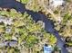 A vacant lot with direct access to the river and an outline of the property's boundaries at 57 Hamilton Heath Dr Dr, Tampa, FL 33604