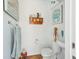 Cozy bathroom features marine-themed wall decorations and towel racks at 6418 Austrian Blvd, Punta Gorda, FL 33982