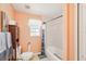 Bathroom features a toilet, shower-tub combo, and neutral color at 6418 Austrian Blvd, Punta Gorda, FL 33982