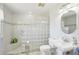 Bright bathroom features a glass block shower and a pedestal sink at 6418 Austrian Blvd, Punta Gorda, FL 33982