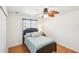 Bright bedroom with a ceiling fan and window offers space for rest at 6418 Austrian Blvd, Punta Gorda, FL 33982