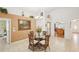 Bright breakfast nook featuring a glass table and charming decor at 6418 Austrian Blvd, Punta Gorda, FL 33982