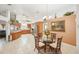Spacious kitchen and breakfast nook with stainless steel appliances and ample cabinet space at 6418 Austrian Blvd, Punta Gorda, FL 33982