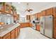 Well-equipped kitchen featuring stainless steel appliances and ample counter space at 6418 Austrian Blvd, Punta Gorda, FL 33982