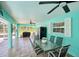 Spacious lanai with tile floor and a table and chairs at 6418 Austrian Blvd, Punta Gorda, FL 33982
