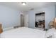 Bedroom with open closet and natural light at 6754 Ralston Beach Cir, Tampa, FL 33614