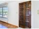 Detailed shot of a carved, decorative wood front door at 7330 Cherry Laurel Dr, Port Richey, FL 34668