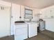 The laundry area features a washer and dryer at 7330 Cherry Laurel Dr, Port Richey, FL 34668