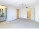 Spacious main bedroom with connecting bathroom and closet space at 7330 Cherry Laurel Dr, Port Richey, FL 34668