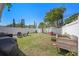 Large, well-maintained backyard with various seating areas and grilling station at 7401 35Th N Ave, St Petersburg, FL 33710
