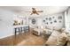Open-concept living room with a large sectional sofa, a breakfast bar, and modern finishes perfect for entertaining and relaxation at 7401 35Th N Ave, St Petersburg, FL 33710