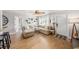 Spacious living room with a large sectional sofa, ample seating, and stylish decor creating a welcoming and comfortable space at 7401 35Th N Ave, St Petersburg, FL 33710