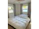Bright bedroom with a large window and minimalist decor at 801 53Rd N Ter, St Petersburg, FL 33703