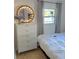 Bedroom featuring modern dresser, mirror and ample natural light at 801 53Rd N Ter, St Petersburg, FL 33703