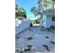 View of side yard with privacy fence, showing the property line and home exterior at 801 53Rd N Ter, St Petersburg, FL 33703