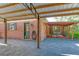 Carport featuring a large paved area at 8136 Honeybee Ln, Tampa, FL 33635