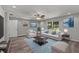 Comfortable living room with a cozy seating arrangement and natural light at 8136 Honeybee Ln, Tampa, FL 33635