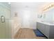 Bathroom featuring tiled floor, shower, tub, and a double vanity at 11118 Golden Silence Dr, Riverview, FL 33579