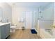Bathroom featuring tiled floor, a shower, tub, and vanity with sink at 11118 Golden Silence Dr, Riverview, FL 33579