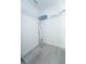 Small closet with flooring, shelving, and extra storage area at 11118 Golden Silence Dr, Riverview, FL 33579