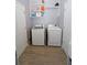 Functional laundry room with modern washer and dryer, offering convenience for laundry tasks at 11118 Golden Silence Dr, Riverview, FL 33579