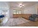 Cozy living room with a large sectional sofa and neutral decor at 11118 Golden Silence Dr, Riverview, FL 33579